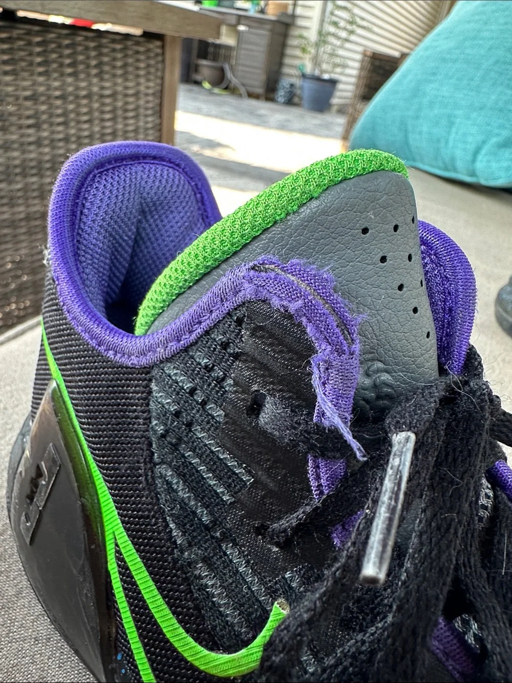 Nike Black Sneakers with Purple Lining and Green Swoosh